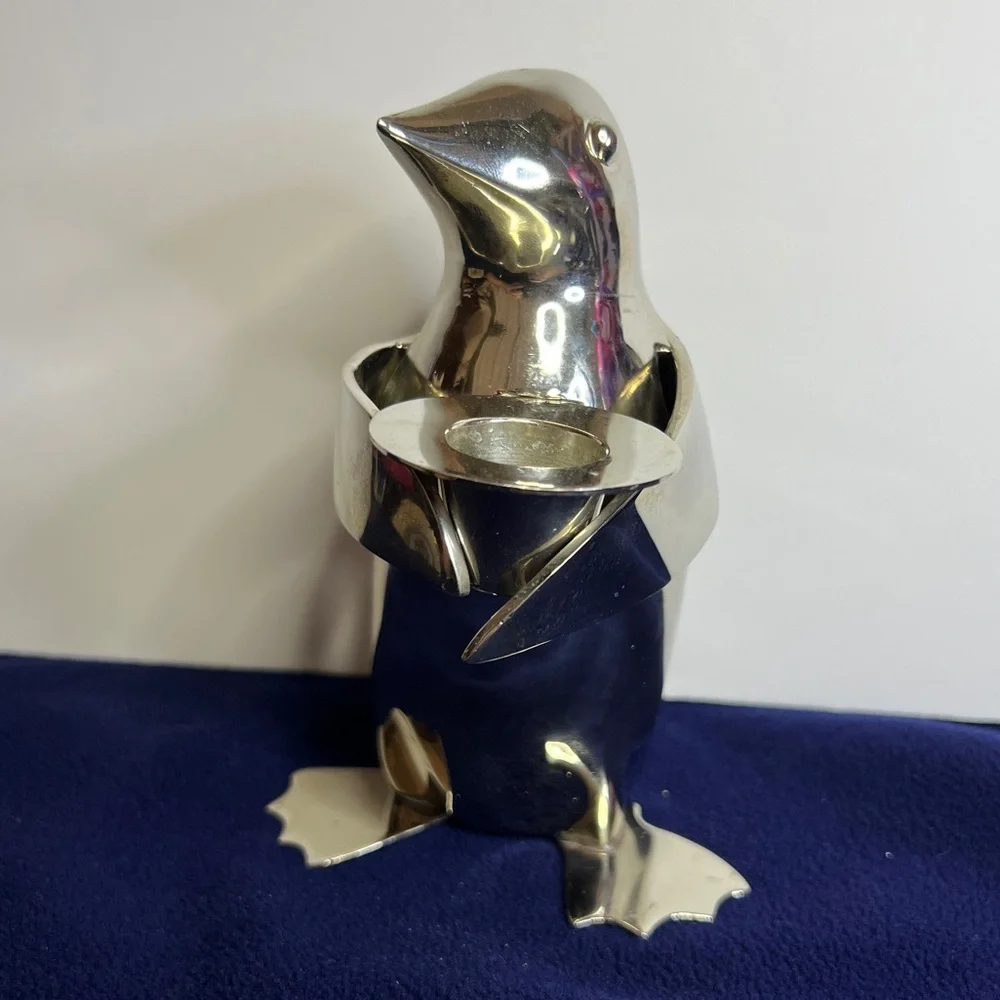 Vintage Restoration Hardware Penguin Candlestick With A Polished Silver Finish